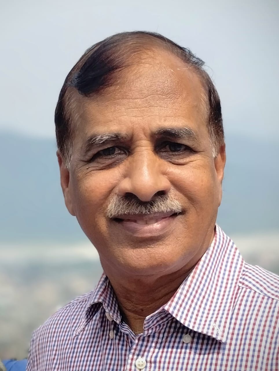 Shri Sridhar V. Naik
